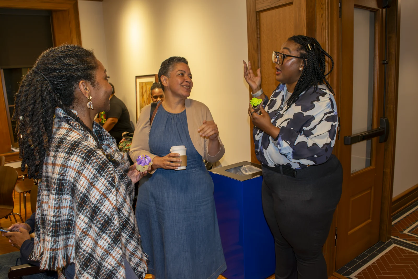 Dr. Mahpiua Deas, Provost and Dean of Faculty at Lincoln University, between Dr. Jacquetta Ayewoh and Dr. Tiffany R. Pennamon, English professors.