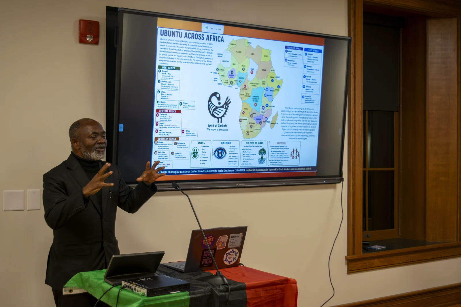 Dr. Lagoke points to the Ubuntu map